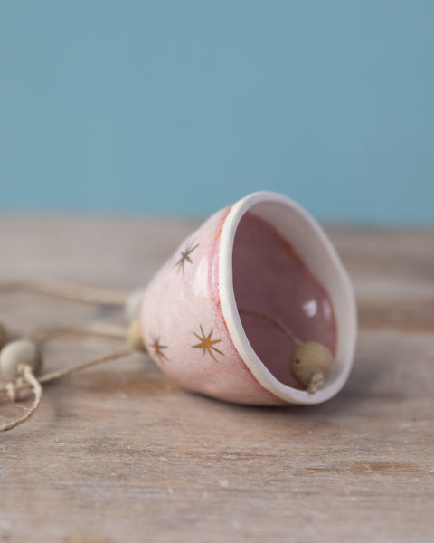 GOLD STAR BELL - WHITE CLAY - PINK GLAZE