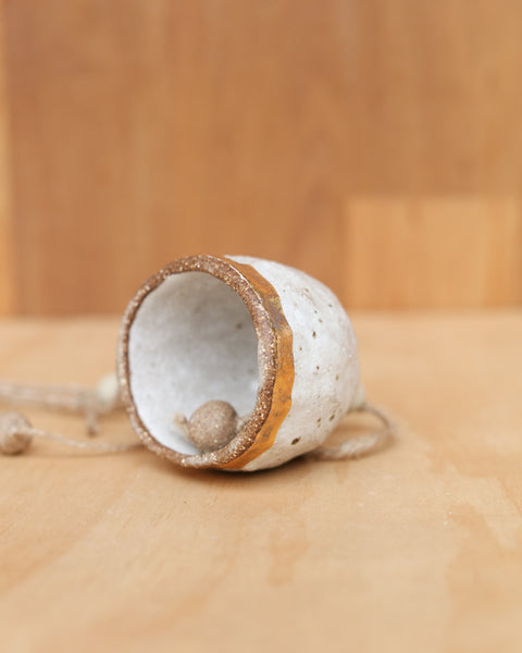 HAND PINCHED CERAMIC BELL - GOLD BAND - SANDY CLAY - WHITE GLAZE